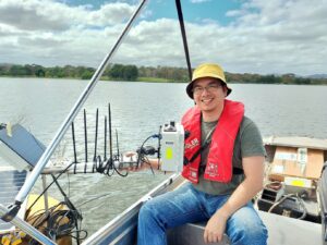 Interview Series: Drought and Saltwater Intrusion in the Mekong Delta: International Science, Local Adaptation Duy Nguyen installing HydraSpectra sensor